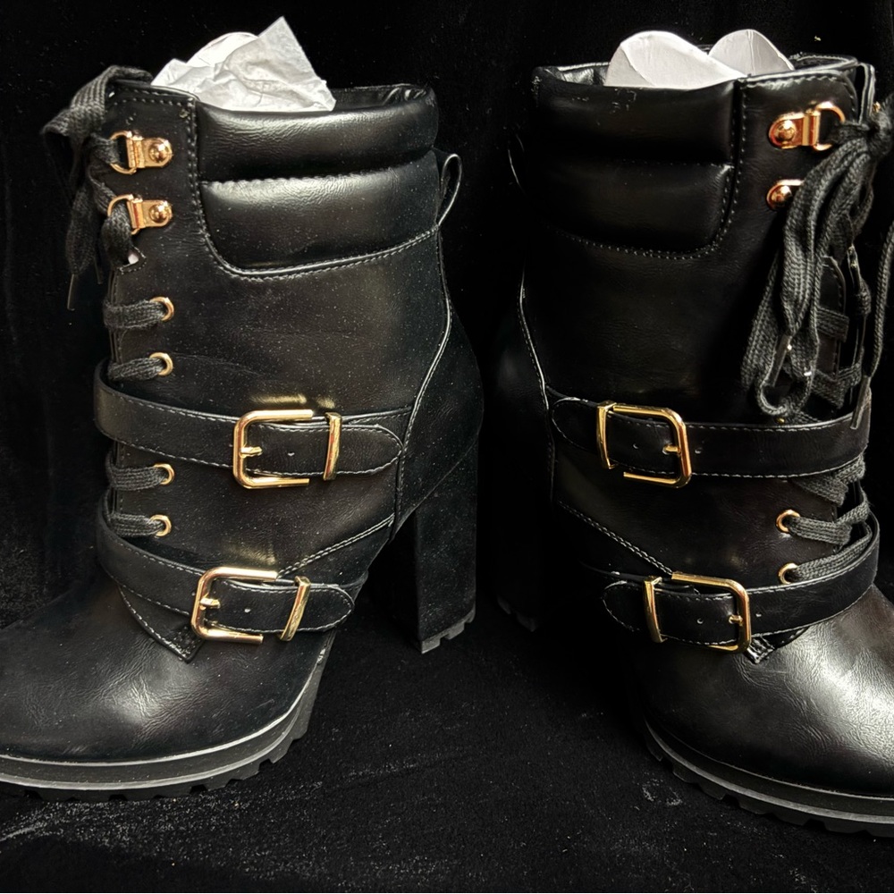 New pair of black ankle boots with heels. Size 8.5